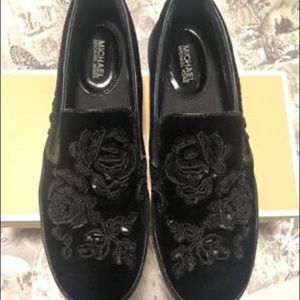 Micheal Kors sneaker size 7.5 US.